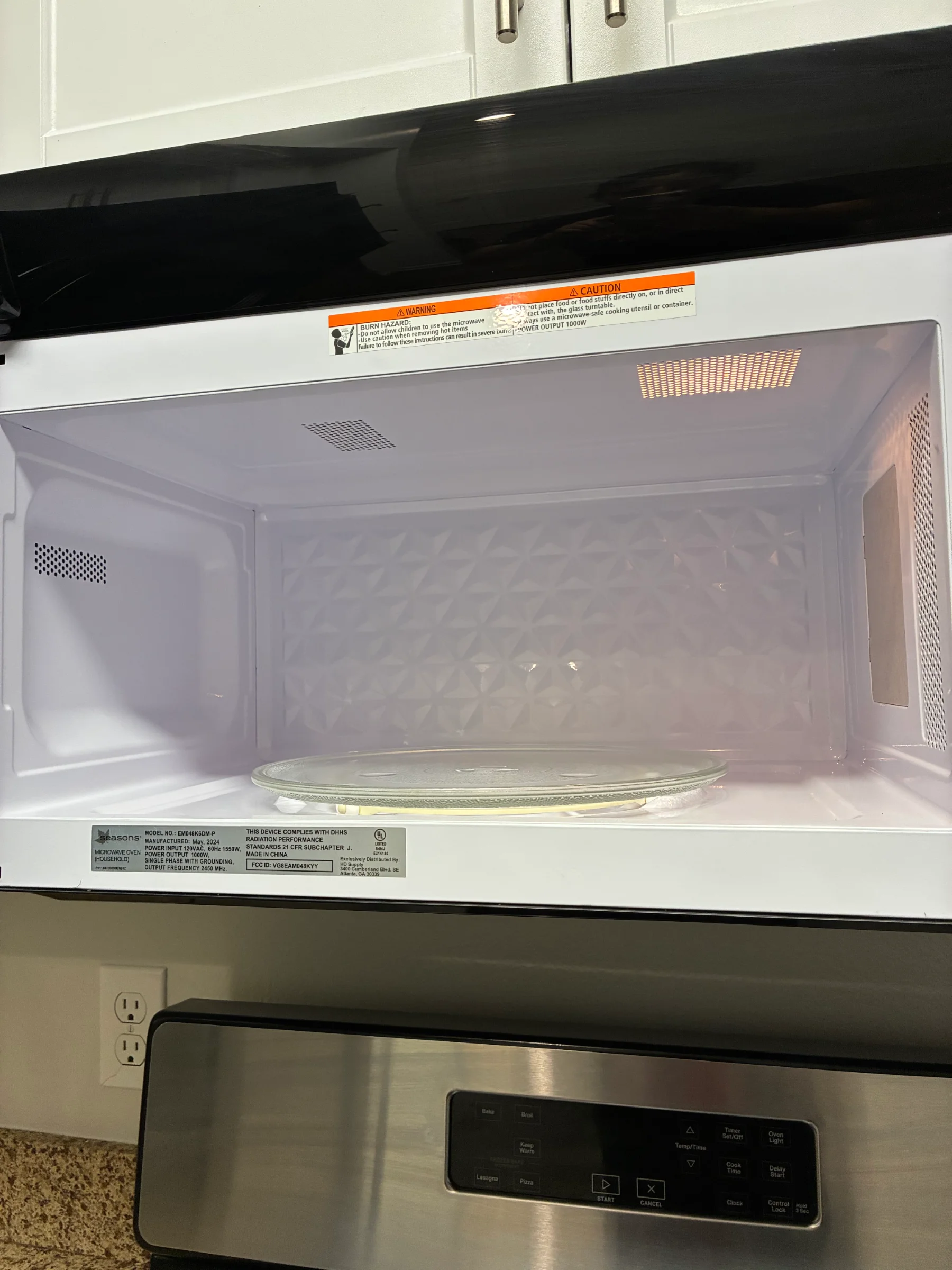 Inside of a spotless microwave after cleaning