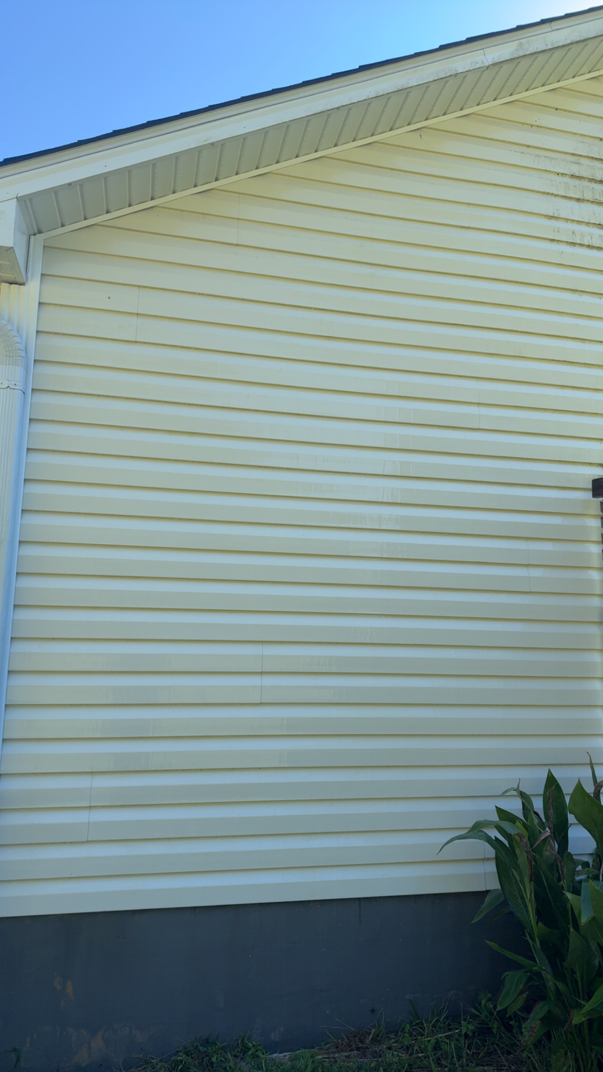The same siding after cleaning, bright and even