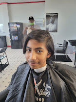 Young client with a longer cut, cleaned up and styled